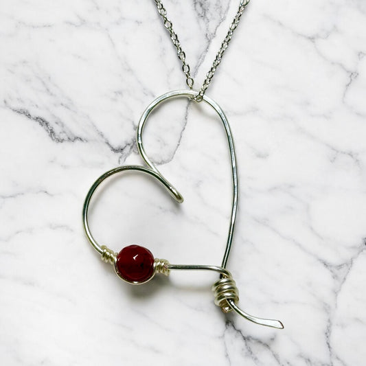 Handcrafted Silver Heart Pendant with Garnet Bead